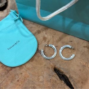 Tiffany’s flat hoop earrings